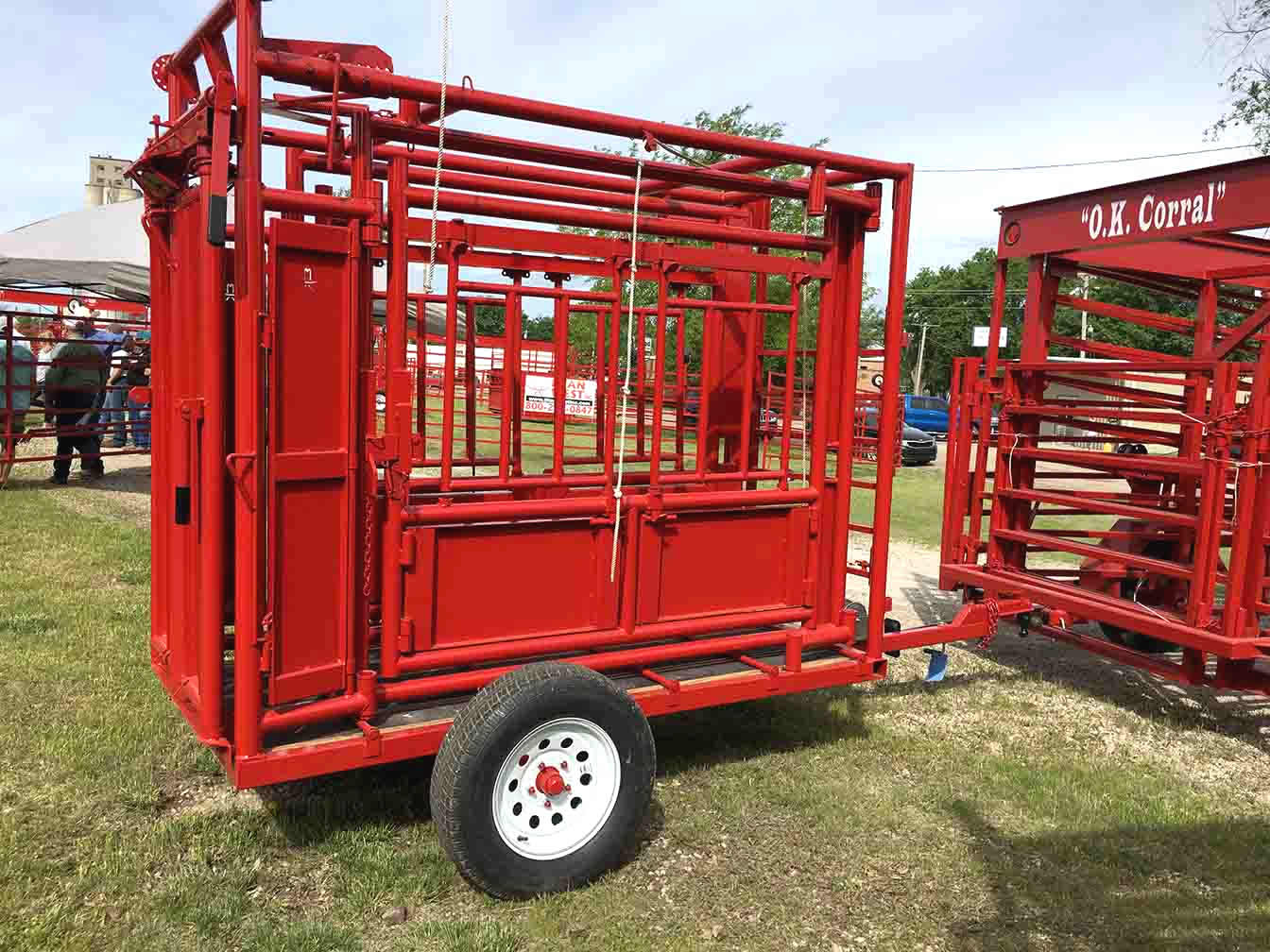 The Equalizer Side Exit Cattle Squeeze Chute w/ Auto or Manual Headgate & Aluminum Sliding Tailgate on a Trailer Attachment