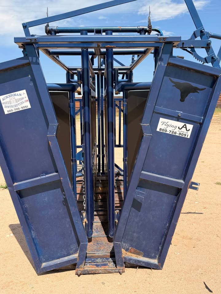The Flying A Side Exit Cattle Squeeze Chute with Manual Headgate & Split Rear Tailgate